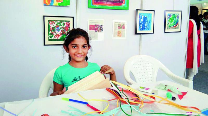 budding talent: Verna Chand, an eight-year-old artist at the Kala Mela. budding talent: Verna Chand, an eight-year-old artist at the Kala Mela.