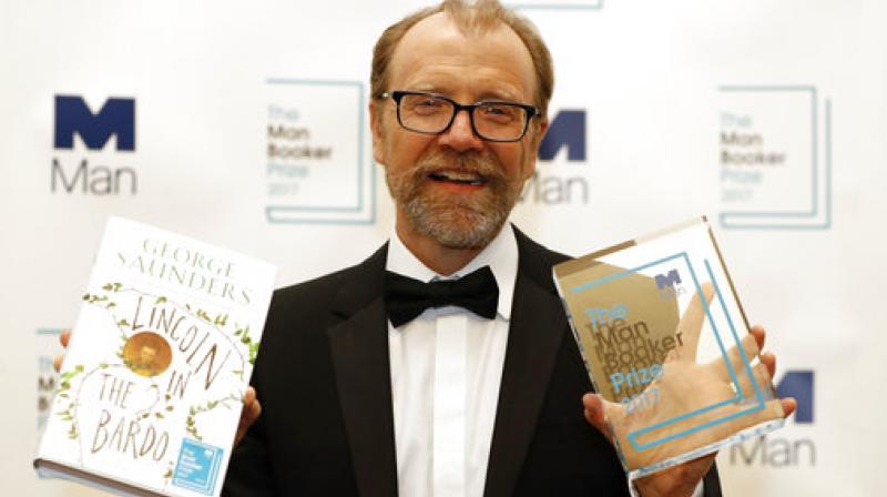 Britain's Camilla, Duchess of Cornwall, presents US author George Saunders with the award for the 2017 Man Booker Prize for Fiction, at the Guildhall in central London on October 17. (Photo: AP) Britain's Camilla, Duchess of Cornwall, presents US author George Saunders with the award for the 2017 Man Booker Prize for Fiction, at the Guildhall in central London on October 17. (Photo: AP)