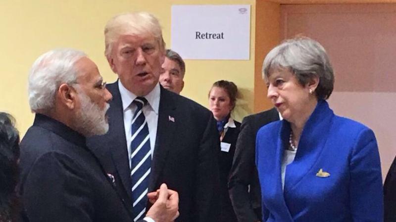 PM Narendra Modi made the lead statement at G20 Leaders' Retreat in Hamburg, Germany. In Picture: US President Donald Trump and German Chancellor Angela Merkel. (Photo: Twitter/MEA India) PM Narendra Modi made the lead statement at G20 Leaders' Retreat in Hamburg, Germany. In Picture: US President Donald Trump and German Chancellor Angela Merkel. (Photo: Twitter/MEA India)