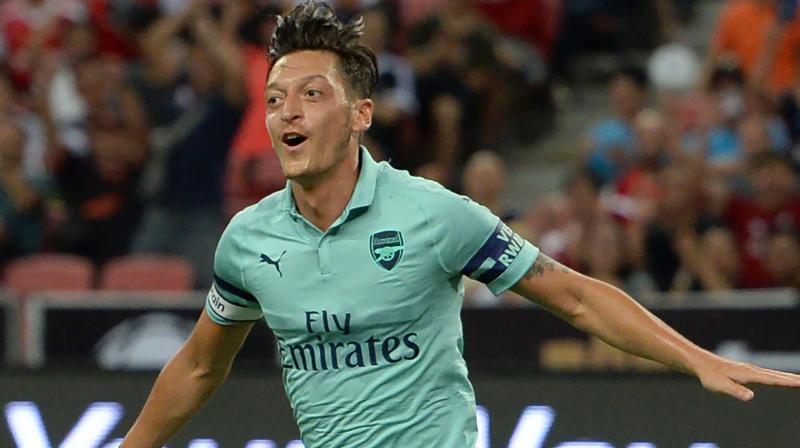 Ozil put Arsenal ahead in the 13th minute before Alexandre Lacazette's quickfire double and late strikes from Rob Holding and Eddie Nketiah against a youthful PSG side. (Photo: AFP) Ozil put Arsenal ahead in the 13th minute before Alexandre Lacazette's quickfire double and late strikes from Rob Holding and Eddie Nketiah against a youthful PSG side. (Photo: AFP)