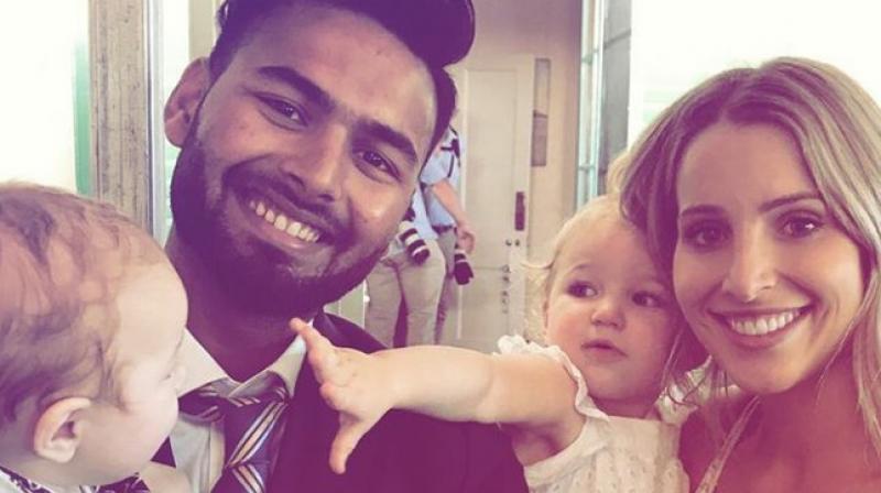 Tim Paine's wife Bonnie put up a picture on her Instagram account which had the 21-year-old Pant holding the home captain's son during an event at the Australian Prime Minister Scott Morrison's residence. (Photo: Instagram / Bon Paine) Tim Paine's wife Bonnie put up a picture on her Instagram account which had the 21-year-old Pant holding the home captain's son during an event at the Australian Prime Minister Scott Morrison's residence. (Photo: Instagram / Bon Paine)