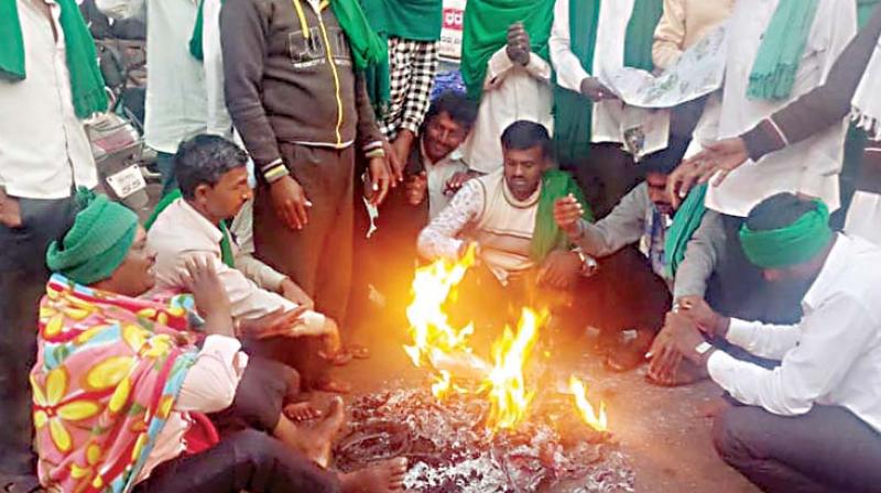 Farmers stage a protest to press for their various demands on Tuesday in Belagavi where the winter session of the state legislature is now being held Farmers stage a protest to press for their various demands on Tuesday in Belagavi where the winter session of the state legislature is now being held