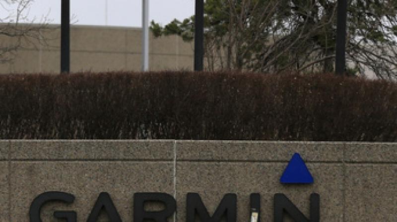 Flags are at half staff at Garmin headquarters Olathe in Kansas. (Photo: AP) Flags are at half staff at Garmin headquarters Olathe in Kansas. (Photo: AP)
