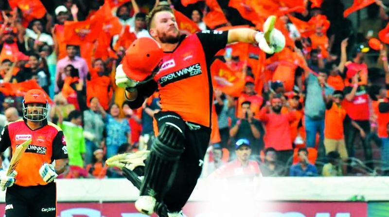 David Warner celebrate his centuries against Royal Challengers Bangalore in Hyderabad on Sunday. David Warner celebrate his centuries against Royal Challengers Bangalore in Hyderabad on Sunday.