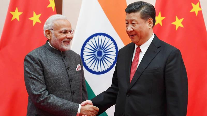 President Xi Jinping told Indian Prime Minister Narendra Modi on the sidelines of a G20 meeting on Friday. (Photo: Twitter/@narendramodi) President Xi Jinping told Indian Prime Minister Narendra Modi on the sidelines of a G20 meeting on Friday. (Photo: Twitter/@narendramodi)