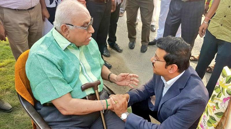 P K Banerjee seen with minister Rajyavardhan Singh Rathore. (Twitter)