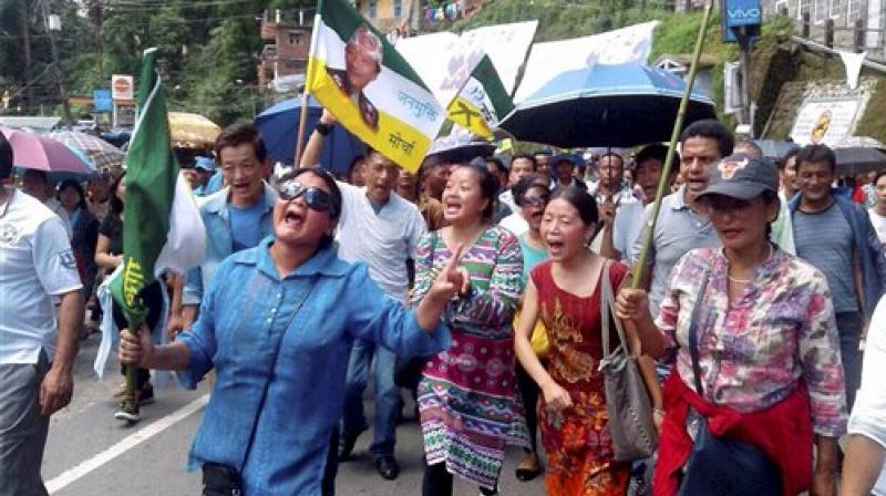 GJM supporters holding a rally for separate Gorkhaland in Darjeeling on Monday. (Photo: PTI) GJM supporters holding a rally for separate Gorkhaland in Darjeeling on Monday. (Photo: PTI)