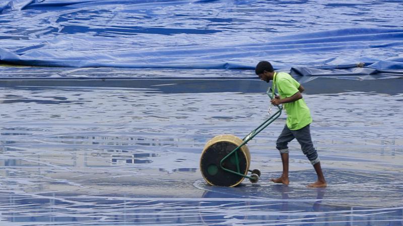 After a washout on Friday, Sunday's game could also be staring at the same fate, as India and West Indies get ready to square off. (Photo: AP) After a washout on Friday, Sunday's game could also be staring at the same fate, as India and West Indies get ready to square off. (Photo: AP)