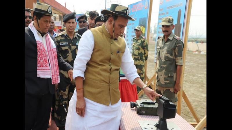 Union Home Minister Rajnath Singh on Tuesday inaugurated the BOLD-QIT (Border Electronically Dominated QRT Interception Technique) under Comprehensive Integrated Border Management System (CIBMS) on Indo-Bangladesh border in Dhubri district of Assam. (Photo: ANI) Union Home Minister Rajnath Singh on Tuesday inaugurated the BOLD-QIT (Border Electronically Dominated QRT Interception Technique) under Comprehensive Integrated Border Management System (CIBMS) on Indo-Bangladesh border in Dhubri district of Assam. (Photo: ANI)