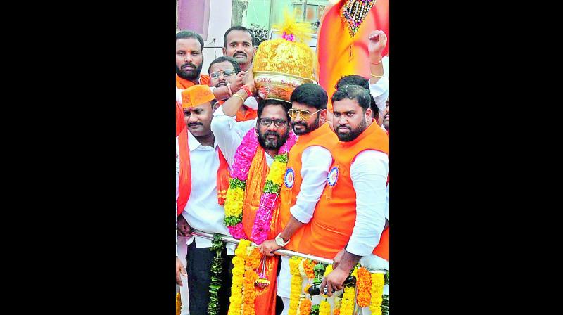 At the Three Temples Ganesha pandal, city police constable B. Sai Krishna closed the bid for Rs 90,000.   DC Image