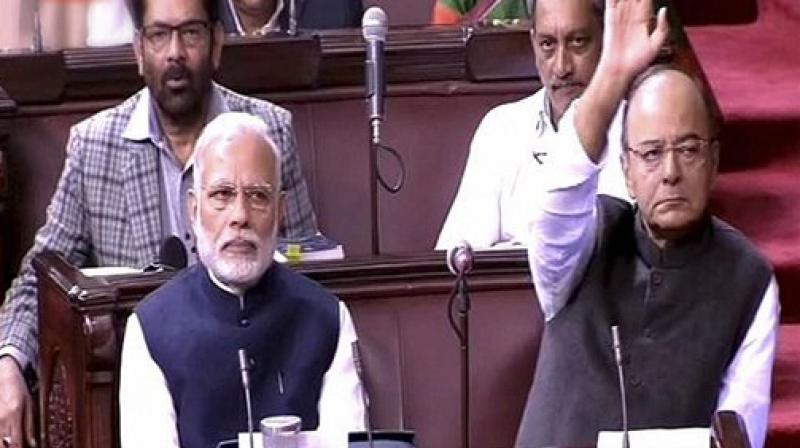 Prime Minister Narendra Modi and Finance Minister Arun Jaitley in the Rajya Sabha. (Photo: PTI) Prime Minister Narendra Modi and Finance Minister Arun Jaitley in the Rajya Sabha. (Photo: PTI)