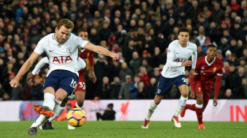 Harry Kane scored his 100th Premier League goal from the penalty spot in stoppage time to snatch a point for Tottenham Hotspur against Liverpool. (Photo: AFP) Harry Kane scored his 100th Premier League goal from the penalty spot in stoppage time to snatch a point for Tottenham Hotspur against Liverpool. (Photo: AFP)