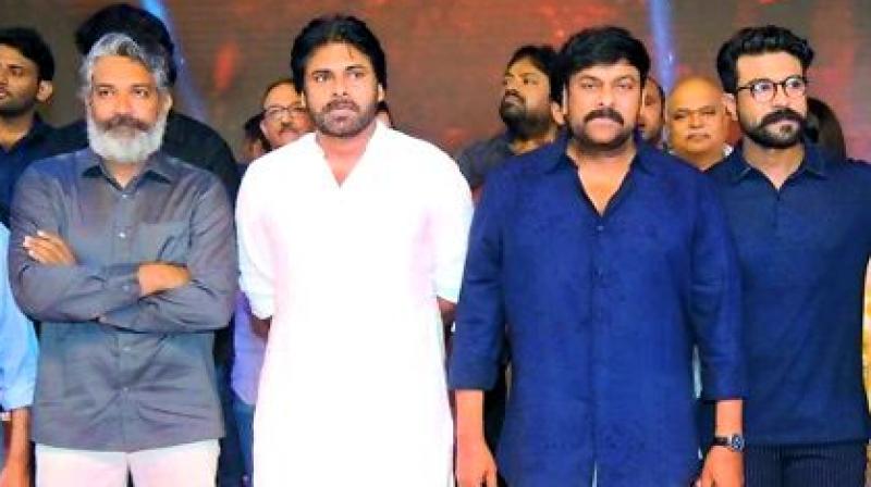 Rajamouli, Pawan Kalyan, Chiranjeevi and Ram Charan at the pre- release event of Sye Raa. Rajamouli, Pawan Kalyan, Chiranjeevi and Ram Charan at the pre- release event of Sye Raa.