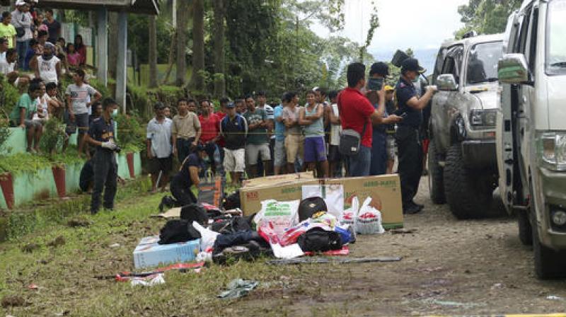 Dimaukom and the nine others were killed at dawn Friday after they opened fire from a van and an SUV on officers manning a checkpoint in Makilala town in North Cotabato province, police said. (Photo: AP) Dimaukom and the nine others were killed at dawn Friday after they opened fire from a van and an SUV on officers manning a checkpoint in Makilala town in North Cotabato province, police said. (Photo: AP)