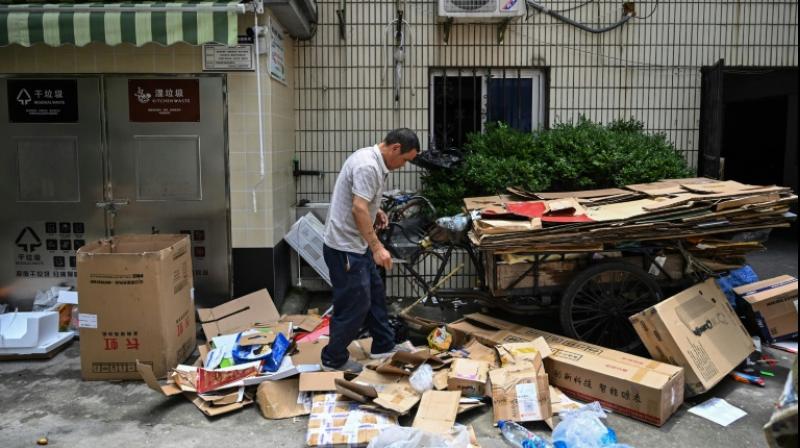 Shanghai is piloting a programme set for eventual nationwide adoption in what would likely be the world's largest waste separation and recycling scheme. ( Photo: AFP) Shanghai is piloting a programme set for eventual nationwide adoption in what would likely be the world's largest waste separation and recycling scheme. ( Photo: AFP)