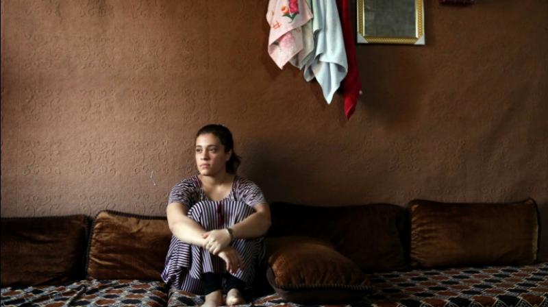 Jihan said she doesn't have any pictures of her children and doesn't want to remember them. (Photo: AFP) Jihan said she doesn't have any pictures of her children and doesn't want to remember them. (Photo: AFP)