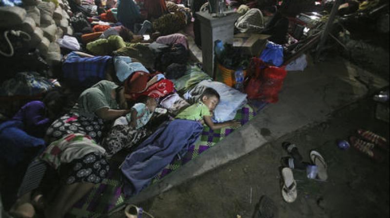 Earthquake survivors sleep on the ground at a temporary shelter in Ulim, Aceh province, Indonesia. (Photo: AP) Earthquake survivors sleep on the ground at a temporary shelter in Ulim, Aceh province, Indonesia. (Photo: AP)