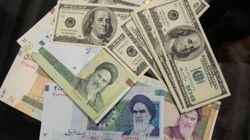 Amid Looming US Sanctions, Iran's Rial Hits Record-Low, 100,000 To Dollar