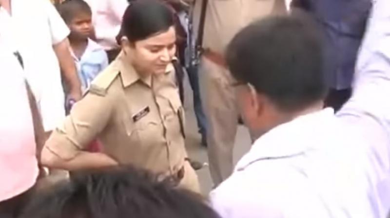 Senior police officer Shreshtha Thakur engage in a verbal altercation with BJP leaders. (Photo: YouTube Screenshot) Senior police officer Shreshtha Thakur engage in a verbal altercation with BJP leaders. (Photo: YouTube Screenshot)