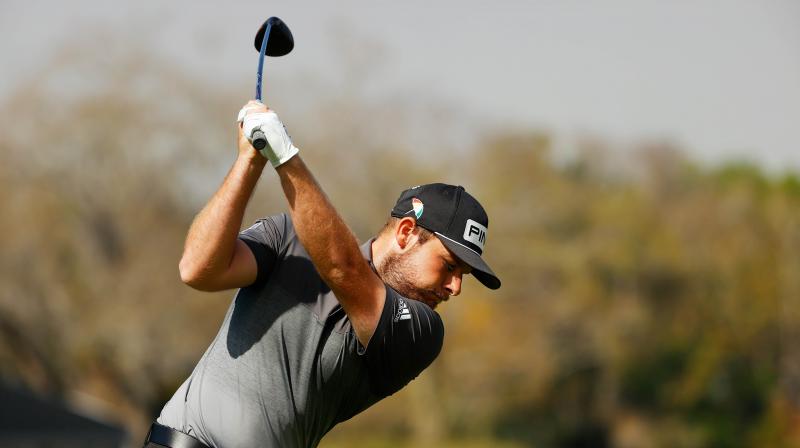 Tyrrell Hatton of England plays his shot from the second tee during the second round of the Arnold Palmer Invitational at the Bay Hill Club and Lodge in Orlando, Florida, on Friday. AFP Photo