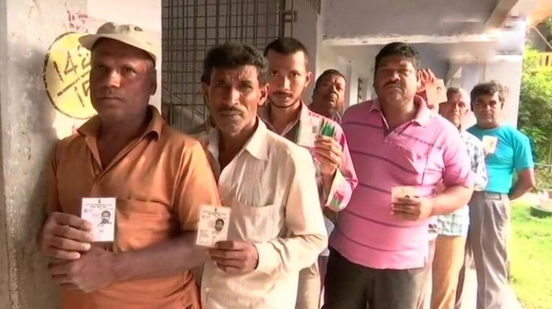 West Bengal Panchayat polls 2018: Voters queue up outside a polling booth in Sirakole village in South 24 Parganas district. (Photo: ANI | Twitter) West Bengal Panchayat polls 2018: Voters queue up outside a polling booth in Sirakole village in South 24 Parganas district. (Photo: ANI | Twitter)