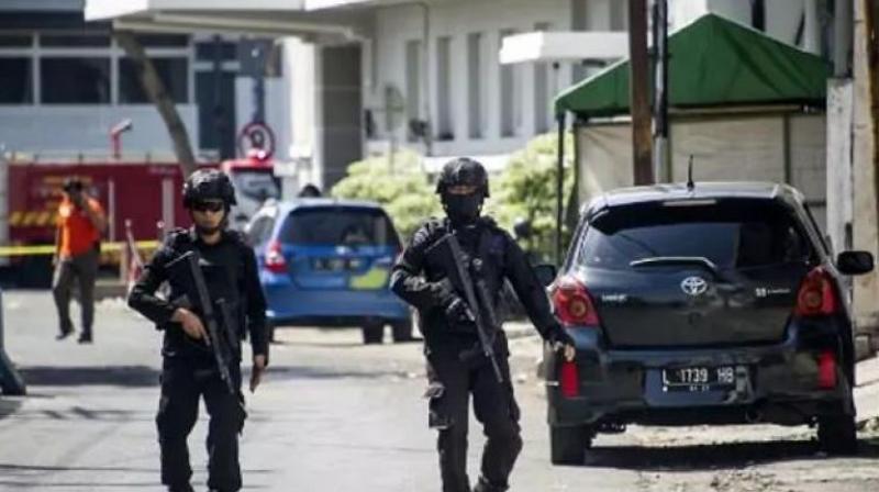 Police patrol outside Surabaya police headquarters following a suicide attack in Surabaya. (Photo: AFP) Police patrol outside Surabaya police headquarters following a suicide attack in Surabaya. (Photo: AFP)