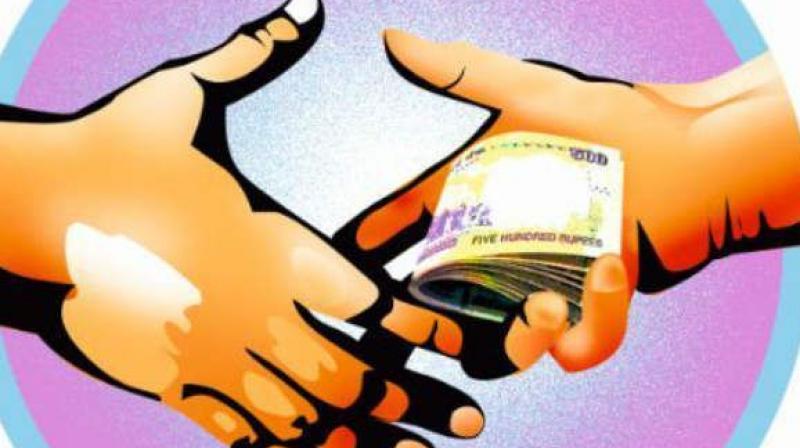 The study has revealed that the perception of the people about increase in corruption has come down from 73 per cent in 2005 to 43 per cent in 2017. (Representational image) The study has revealed that the perception of the people about increase in corruption has come down from 73 per cent in 2005 to 43 per cent in 2017. (Representational image)