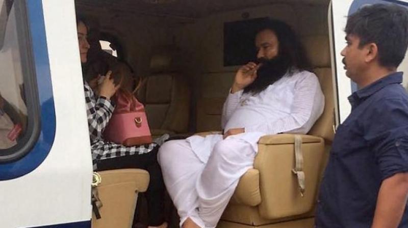 Both sentences will run consecutively for a total of 20 years in jail for the flamboyant guru who has millions of followers. (Photo: PTI) Both sentences will run consecutively for a total of 20 years in jail for the flamboyant guru who has millions of followers. (Photo: PTI)