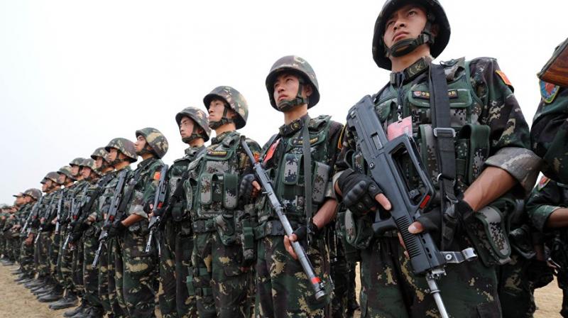 The Chinese Foreign Ministry said on Wednesday that 53 people and a bulldozer from India remain in Chinese territory as of Monday. (Photo: AFP) The Chinese Foreign Ministry said on Wednesday that 53 people and a bulldozer from India remain in Chinese territory as of Monday. (Photo: AFP)