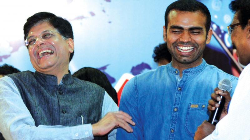 Union minister of state of power Piyush Goyal shares a light moment with Indian hockey team captain PR Sreejesh during the inauguration of Digi Dhan Mela in Kochi on Tuesday (Photo: ARUNCHANDRA BOSE) Union minister of state of power Piyush Goyal shares a light moment with Indian hockey team captain PR Sreejesh during the inauguration of Digi Dhan Mela in Kochi on Tuesday (Photo: ARUNCHANDRA BOSE)