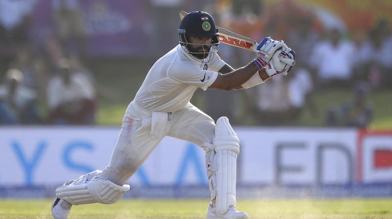 Virat Kohli scored 76 runs, which included a 133 run partnership with opener Abhinav Mukund, who scored 81. (Photo: AP) Virat Kohli scored 76 runs, which included a 133 run partnership with opener Abhinav Mukund, who scored 81. (Photo: AP)