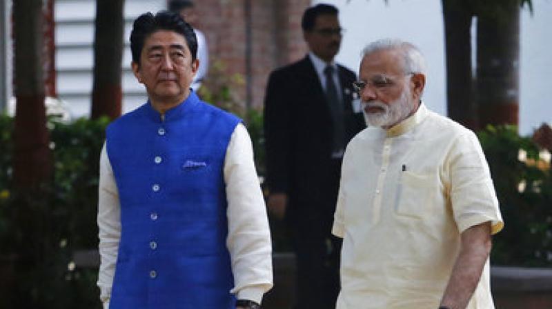 Shinzo Abe, Narendra Modi Japanese Prime Minister Shinzo Abe, left, and Indian Prime Minister Narendra Modi walk inside Sabarmati Ashram, or Gandhi Ashram, in Ahmadabad, India. Shinzo Abe, Narendra Modi Japanese Prime Minister Shinzo Abe, left, and Indian Prime Minister Narendra Modi walk inside Sabarmati Ashram, or Gandhi Ashram, in Ahmadabad, India.