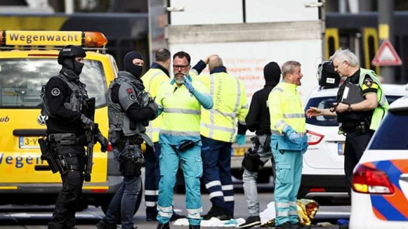 Armed police and emergency vehicles surrounding a tram that had stopped near a road bridge. (Photo: AFP) Armed police and emergency vehicles surrounding a tram that had stopped near a road bridge. (Photo: AFP)