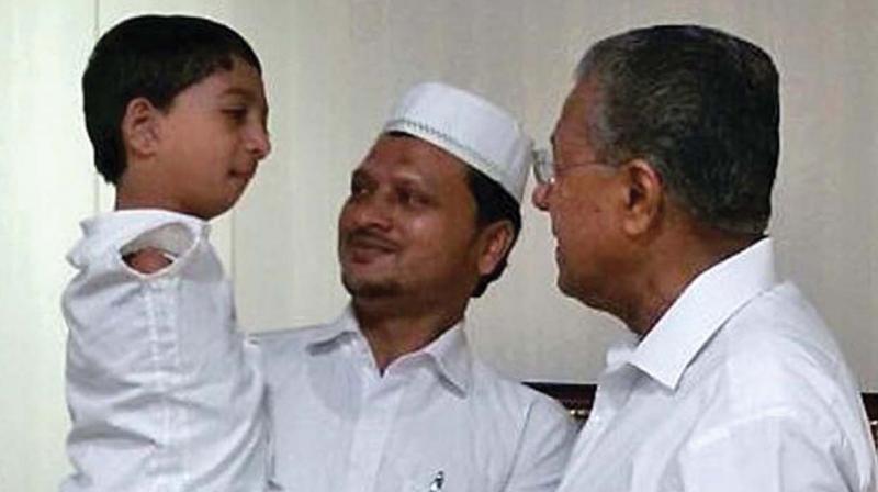 Mohammed Asim and his father Mohammed Shaheed with CM Pinarayi Vijayan. (File picture) Mohammed Asim and his father Mohammed Shaheed with CM Pinarayi Vijayan. (File picture)