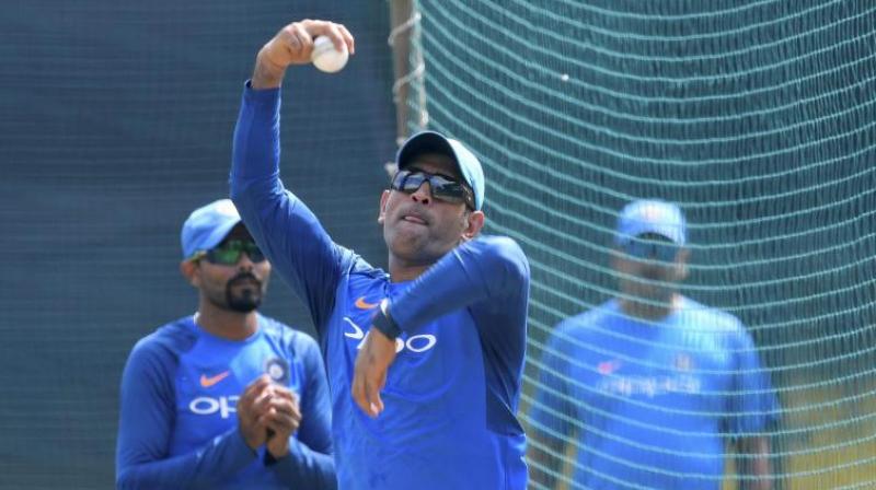 In 2017 during the ODI series against Australia, that Dhoni bowled alongside the three other spinners in the squad – Kuldeep Yadav, Axar Patel, and Ravindra Jadeja. (Photo: PTI) In 2017 during the ODI series against Australia, that Dhoni bowled alongside the three other spinners in the squad – Kuldeep Yadav, Axar Patel, and Ravindra Jadeja. (Photo: PTI)