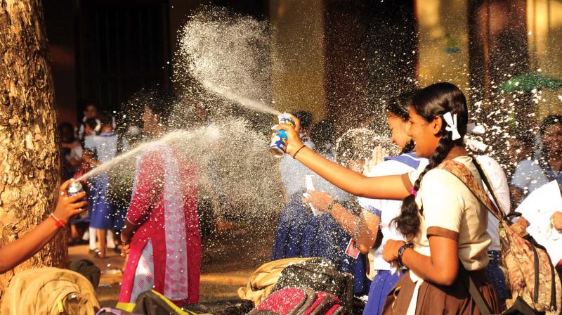 Elated students of Sacred Heart Convent Girls High School celebrate after the final SSLC exam with snow spray in Thrissur on Thursday. — (Photo: Anup K. Venu) Elated students of Sacred Heart Convent Girls High School celebrate after the final SSLC exam with snow spray in Thrissur on Thursday. — (Photo: Anup K. Venu)