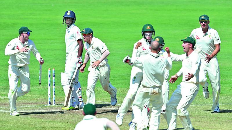 Australian players are jubilant after winning the first Test in Pune by 333 runs. (Photo: PTI) Australian players are jubilant after winning the first Test in Pune by 333 runs. (Photo: PTI)