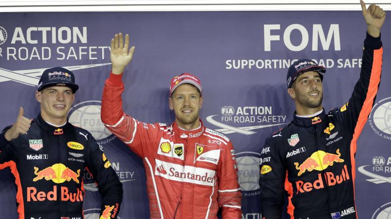 Ferrari's Sebastien Vettel, Red Bull's Max Verstappen and Daniel Ricciardo wave to fans after finishing top three. (Photo: AP) Ferrari's Sebastien Vettel, Red Bull's Max Verstappen and Daniel Ricciardo wave to fans after finishing top three. (Photo: AP)