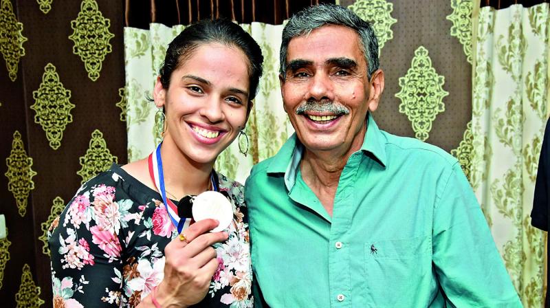 Saina Nehwal with her father Harvir Singh Saina Nehwal with her father Harvir Singh