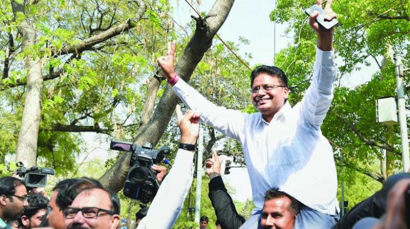 AAP MLA Vijender Garg celebrates after Delhi High Court ruling in New Delhi. (Photo: PTI) AAP MLA Vijender Garg celebrates after Delhi High Court ruling in New Delhi. (Photo: PTI)