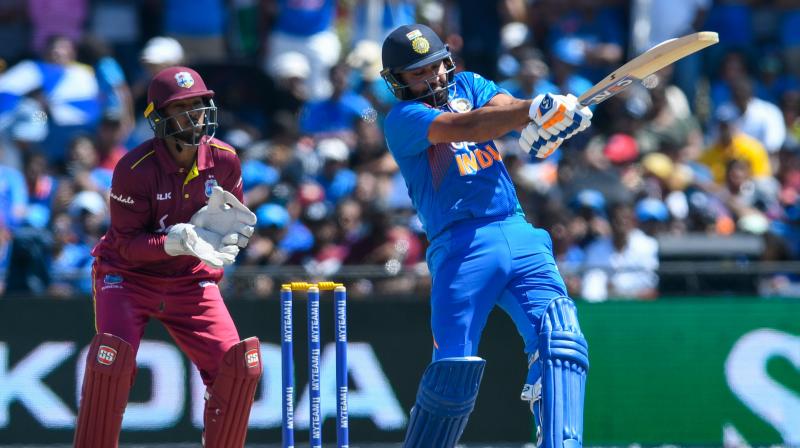 Rohit Sharma top-scored with 67 off 51 balls, setting India up for a challenging total, before Krunal Pandya (20 off 13 balls) and Ravindra Jadeja propped up the innings by smashing 20 runs in the final over, which was bowled by Keemo Paul. (Photo:AFP) Rohit Sharma top-scored with 67 off 51 balls, setting India up for a challenging total, before Krunal Pandya (20 off 13 balls) and Ravindra Jadeja propped up the innings by smashing 20 runs in the final over, which was bowled by Keemo Paul. (Photo:AFP)