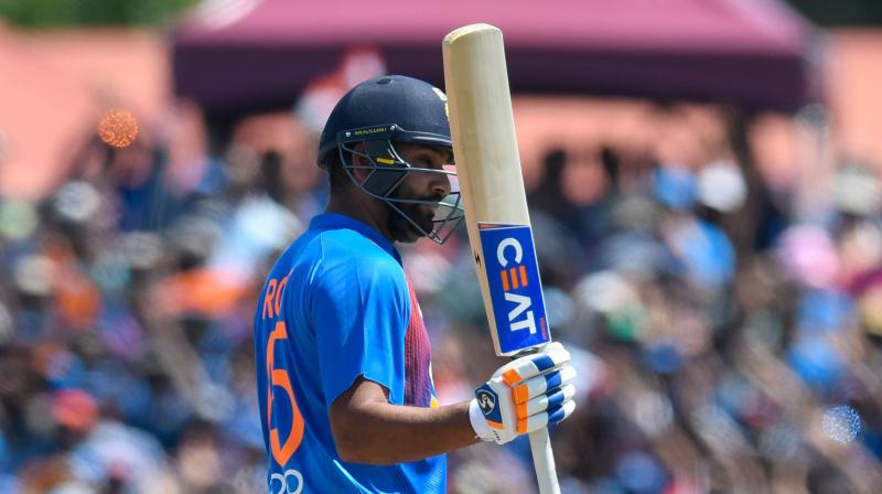 Rohit Sharma blasted two sixes to go past West Indies's Chris Gayle at the top spot. (Photo:AFP) Rohit Sharma blasted two sixes to go past West Indies's Chris Gayle at the top spot. (Photo:AFP)