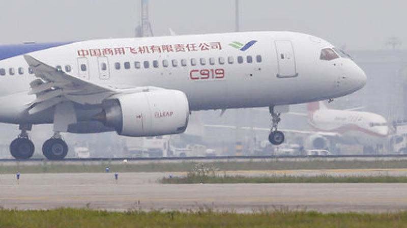 The first large Chinese-made passenger jetliner C919 took off on Friday on its maiden flight. (Photo: Aly Song/Pool Photo via AP) The first large Chinese-made passenger jetliner C919 took off on Friday on its maiden flight. (Photo: Aly Song/Pool Photo via AP)