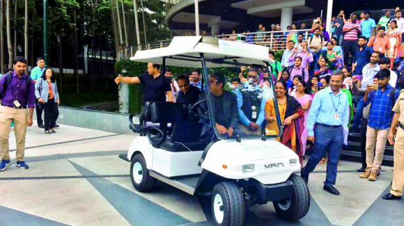 Infosys CEO Vishal Sikka on Friday arrived at the Infosys campus in Bengaluru in a driverless cart that was built indigenously at the company's facility in Mysuru. Infosys, in association with IIT, Delhi, developed the tech used to drive the cart. Infosys CEO Vishal Sikka on Friday arrived at the Infosys campus in Bengaluru in a driverless cart that was built indigenously at the company's facility in Mysuru. Infosys, in association with IIT, Delhi, developed the tech used to drive the cart.