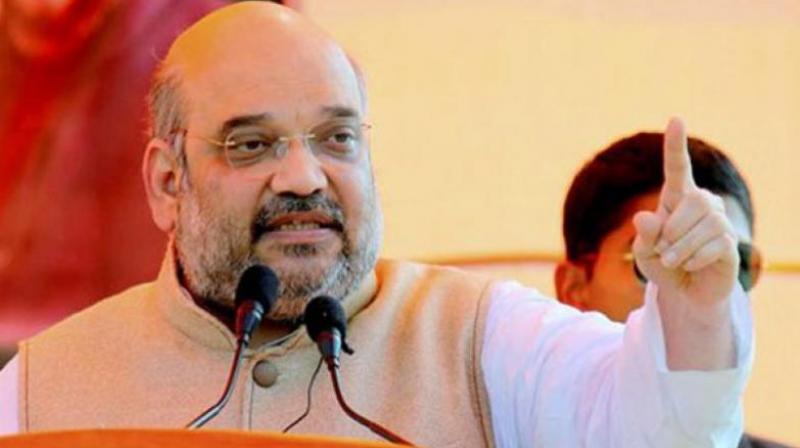 Shah, who is a on a three-day visit to the state, said that all political parties should discuss the issue of holding Lok Sabha and Assembly elections simultaneously and take it up with the Election Commission. (Photo: PTI) Shah, who is a on a three-day visit to the state, said that all political parties should discuss the issue of holding Lok Sabha and Assembly elections simultaneously and take it up with the Election Commission. (Photo: PTI)