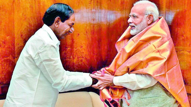 Chief Minister K. Chandrasekhar Rao greets Prime Minister Narendra Modi in Parliament House, New Delhi on Wednesday. Chief Minister K. Chandrasekhar Rao greets Prime Minister Narendra Modi in Parliament House, New Delhi on Wednesday.