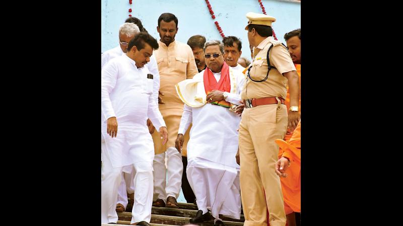 Chief Minister Siddaramaiah arrives to offer bagina to river Krishna at Almatti dam in Bagalkote on Friday. Water resources minister M.B. Patil was also present Chief Minister Siddaramaiah arrives to offer bagina to river Krishna at Almatti dam in Bagalkote on Friday. Water resources minister M.B. Patil was also present
