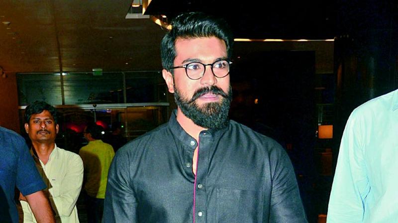 Ram Charan was spotted in this black kurta during one of his recent public appearances Ram Charan was spotted in this black kurta during one of his recent public appearances