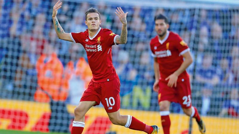 Liverpool’s Philippe Coutinho (left) celebrates scoring in their Premier League match against hosts Leicester City at the King Power Stadium on Saturday (Photo: AP) Liverpool’s Philippe Coutinho (left) celebrates scoring in their Premier League match against hosts Leicester City at the King Power Stadium on Saturday (Photo: AP)