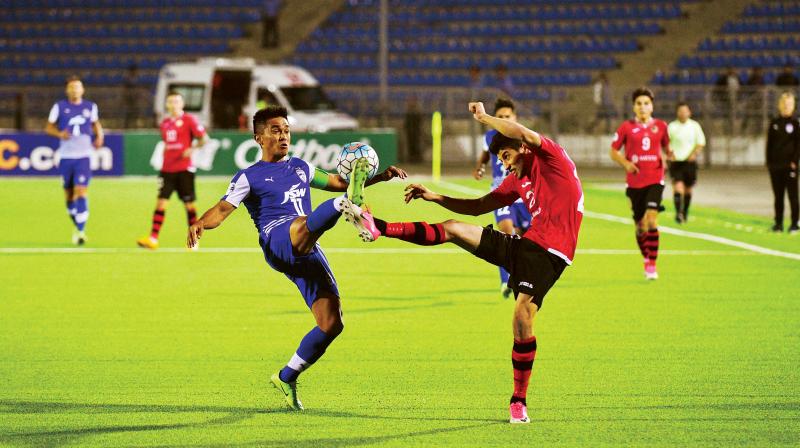 Sunil Chettri vies for the ball against an FC Istiklol defender on Wednesday (Photo: DC) Sunil Chettri vies for the ball against an FC Istiklol defender on Wednesday (Photo: DC)